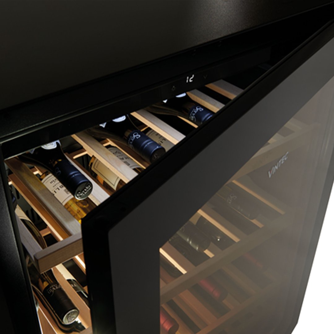 Close up of a Vintec wine cabinet with the door slightly ajar