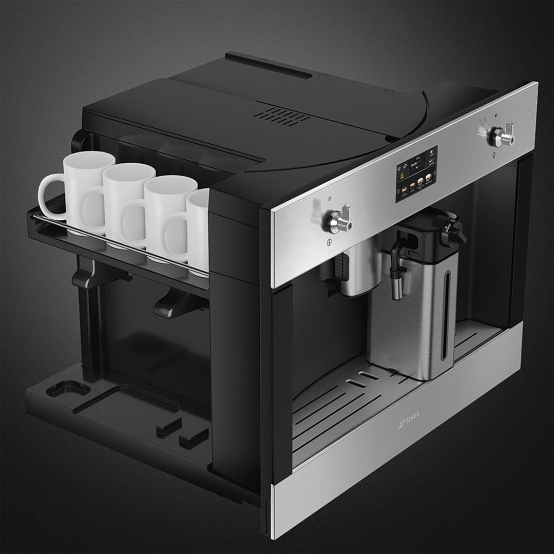 SMEG coffee machine with four white mugs on a side shelf