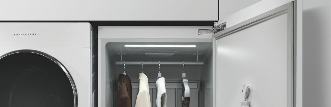 A Fisher & Paykel dryer alongside a drying cabinet